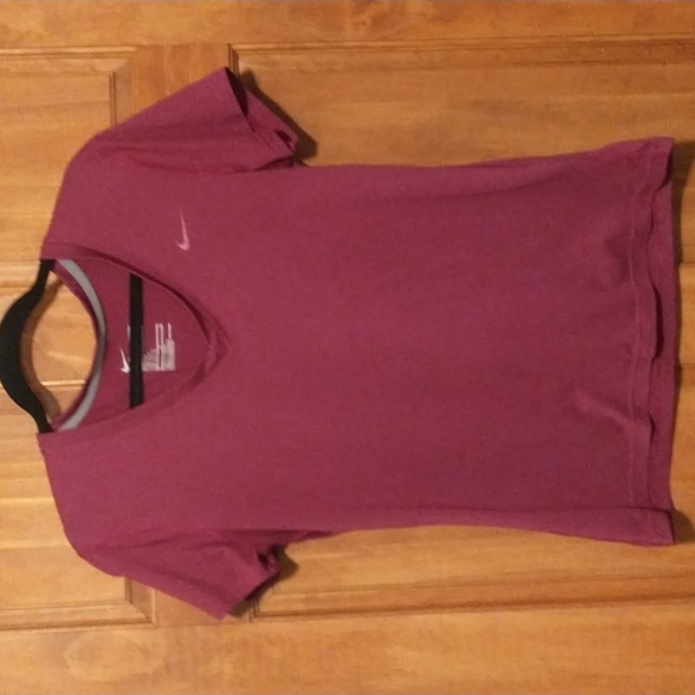 Nike woman's size M short sleeve dri-fit regular fit shirt with swoosh